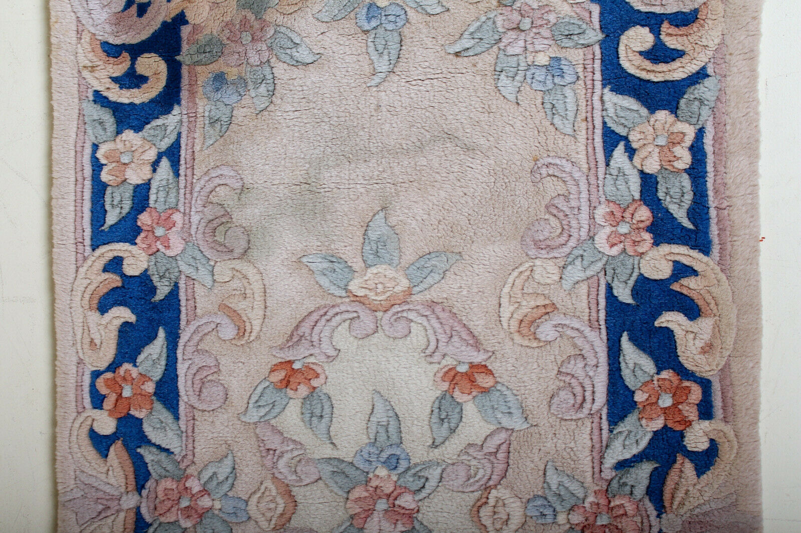 Chinese fringe rug with floral pattern on blue and beige background 63x143cm