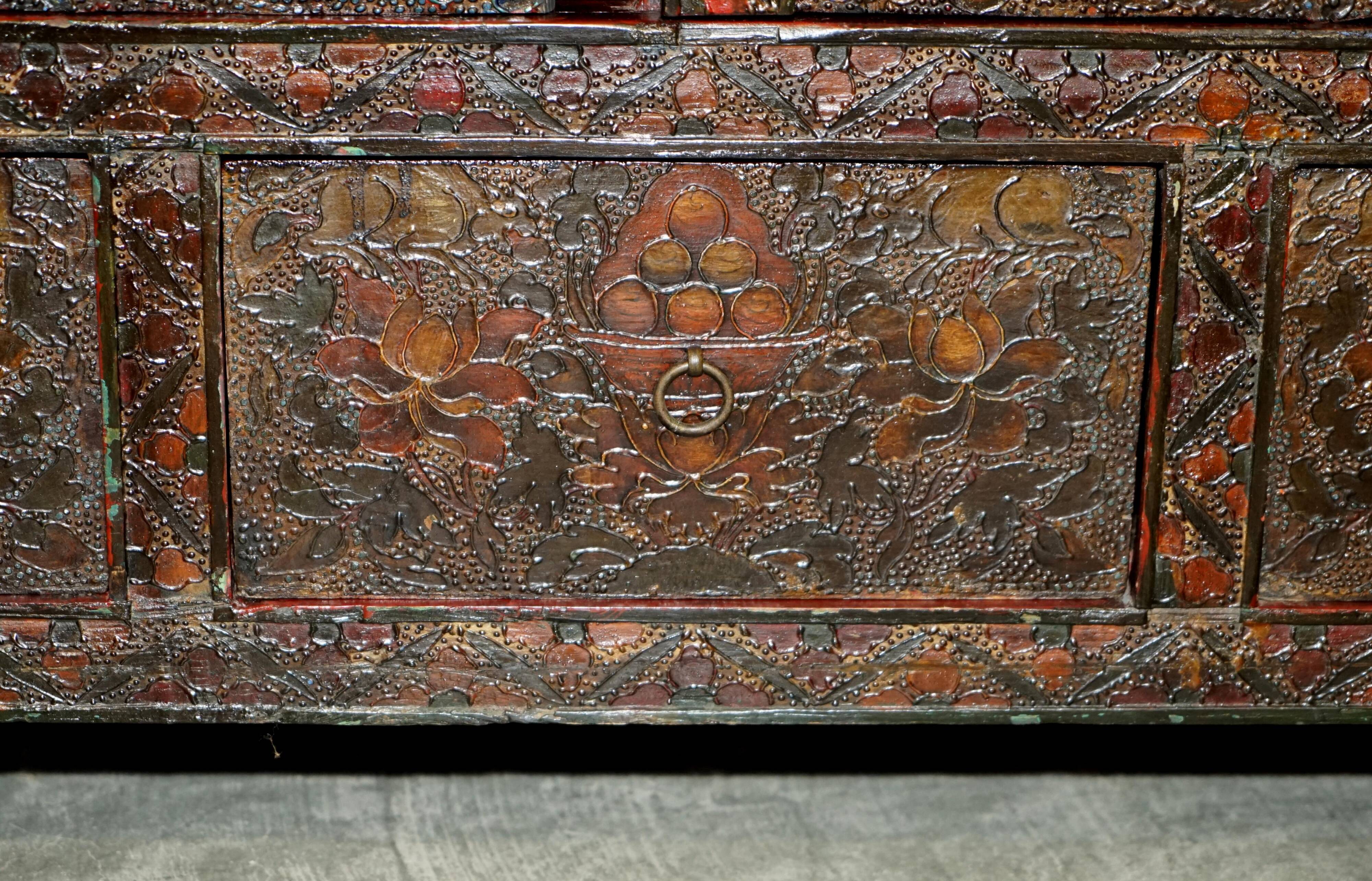 Antique polychrome Tibetan altar cabinet with deer and flowers.