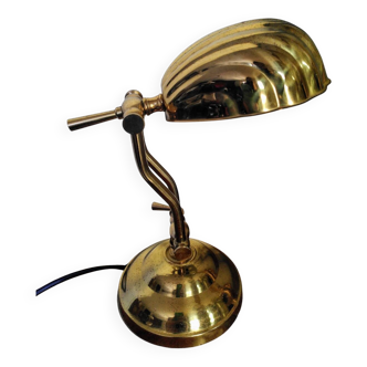 Articulated shell lamp in gold metal