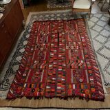 Hand woven flat woven Iraqi artisan rug.