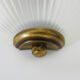 Pair of Mathias wall lamps in gilded metal and white shell-style glass