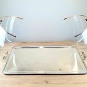 Large serving platter with lid, in silver metal.