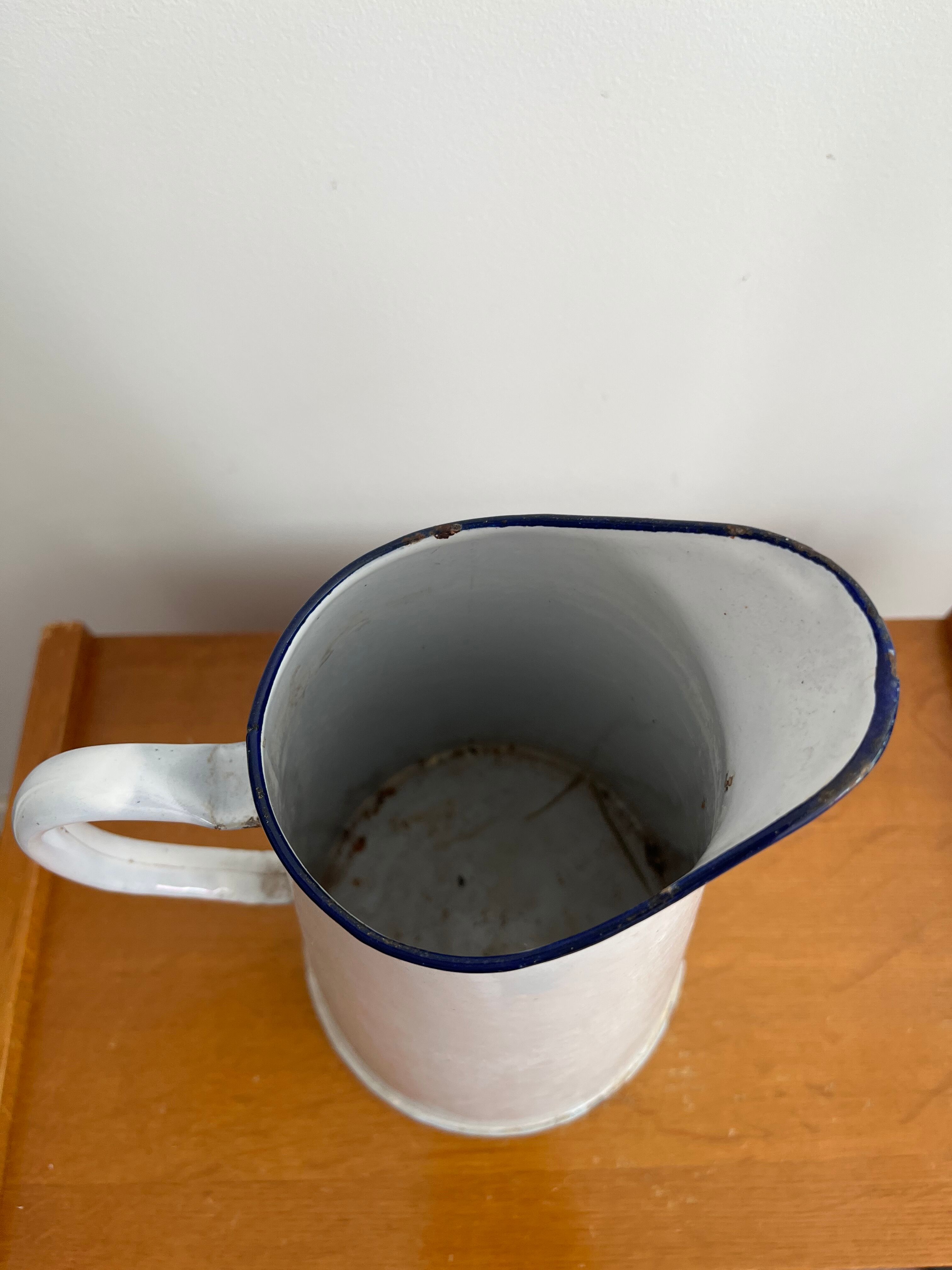 Antique enamelled broc vase