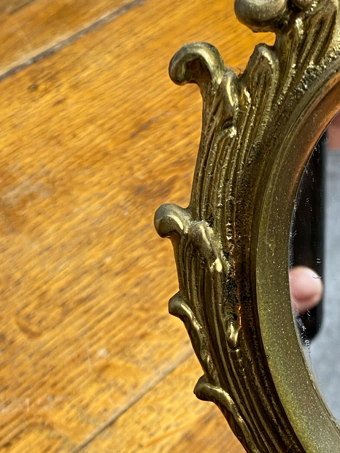 Small antique bronze mirror