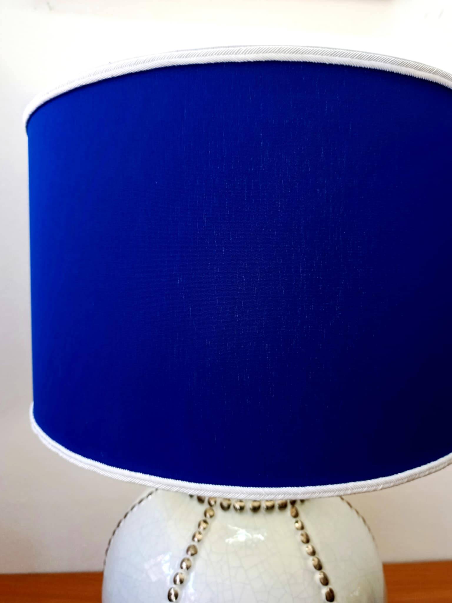 Longwy earthenware lamp and Klein blue lampshade
