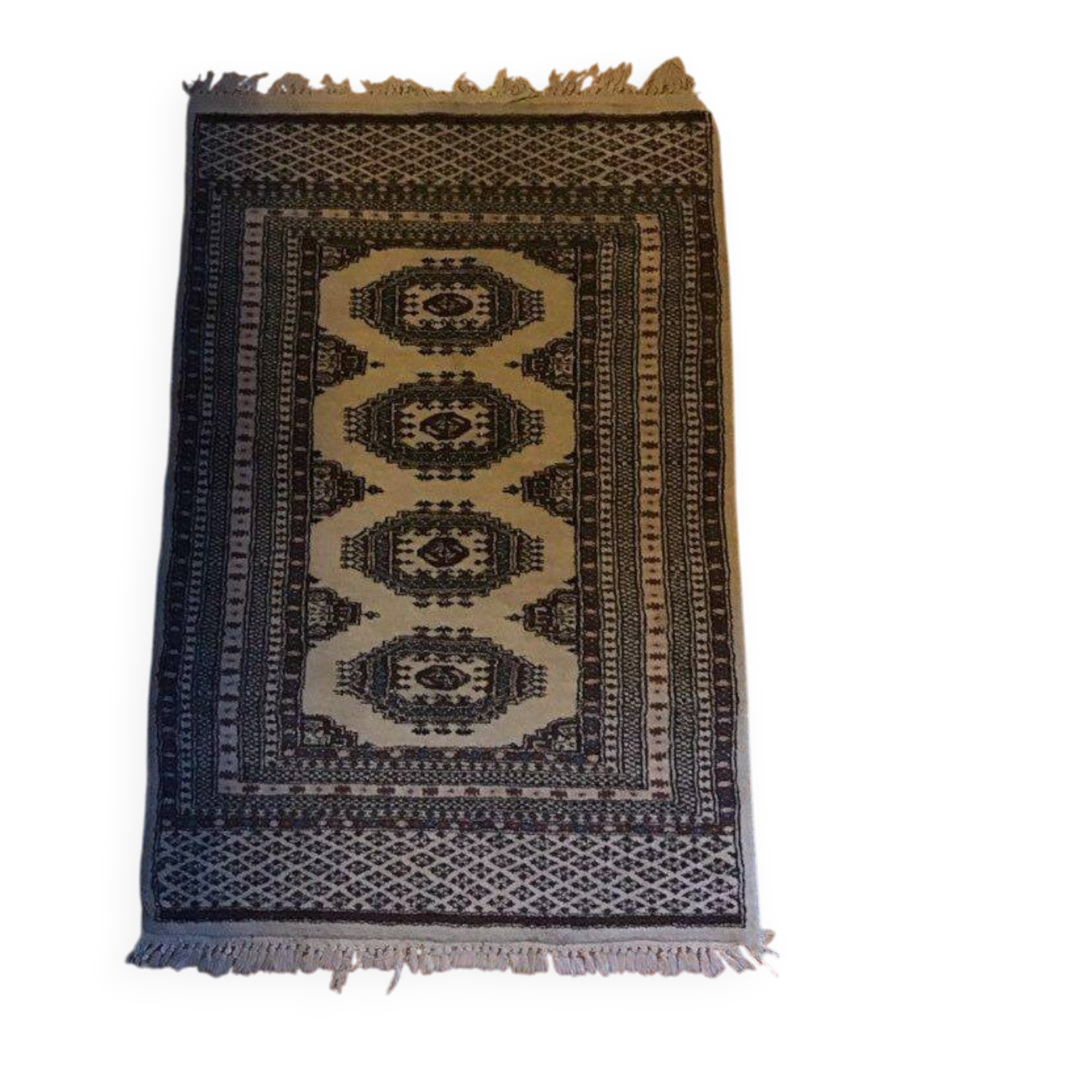 Vintage rug with oriental and geometric patterns, fringes, 63 × 90 cm