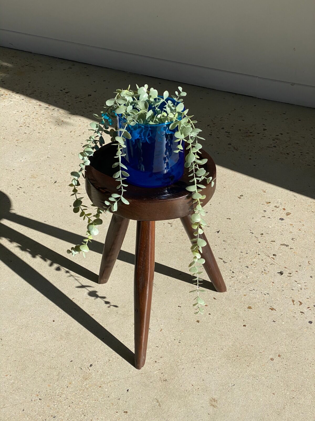 Brown solid wood stool seated circular dug