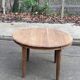 Renovated round Art Deco dining table, extendable, made of solid oak, 210cm.