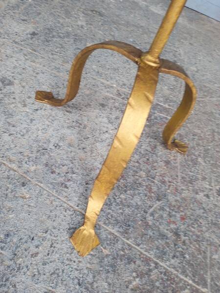 Minimalist brutalist gold metal pedestal table