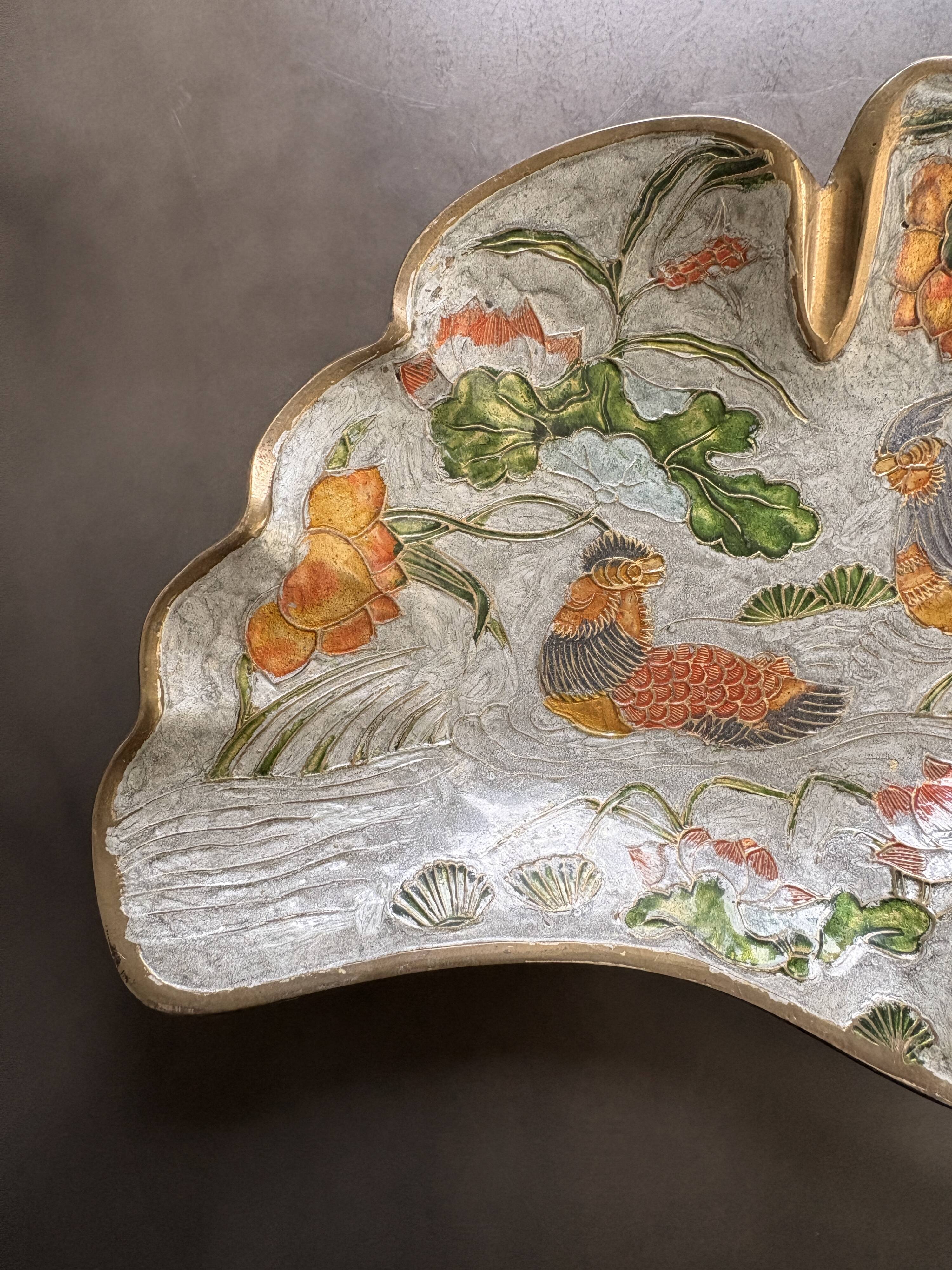 Old brass pocket emptier