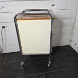 Mid-20th century metal cabinet table on wheels