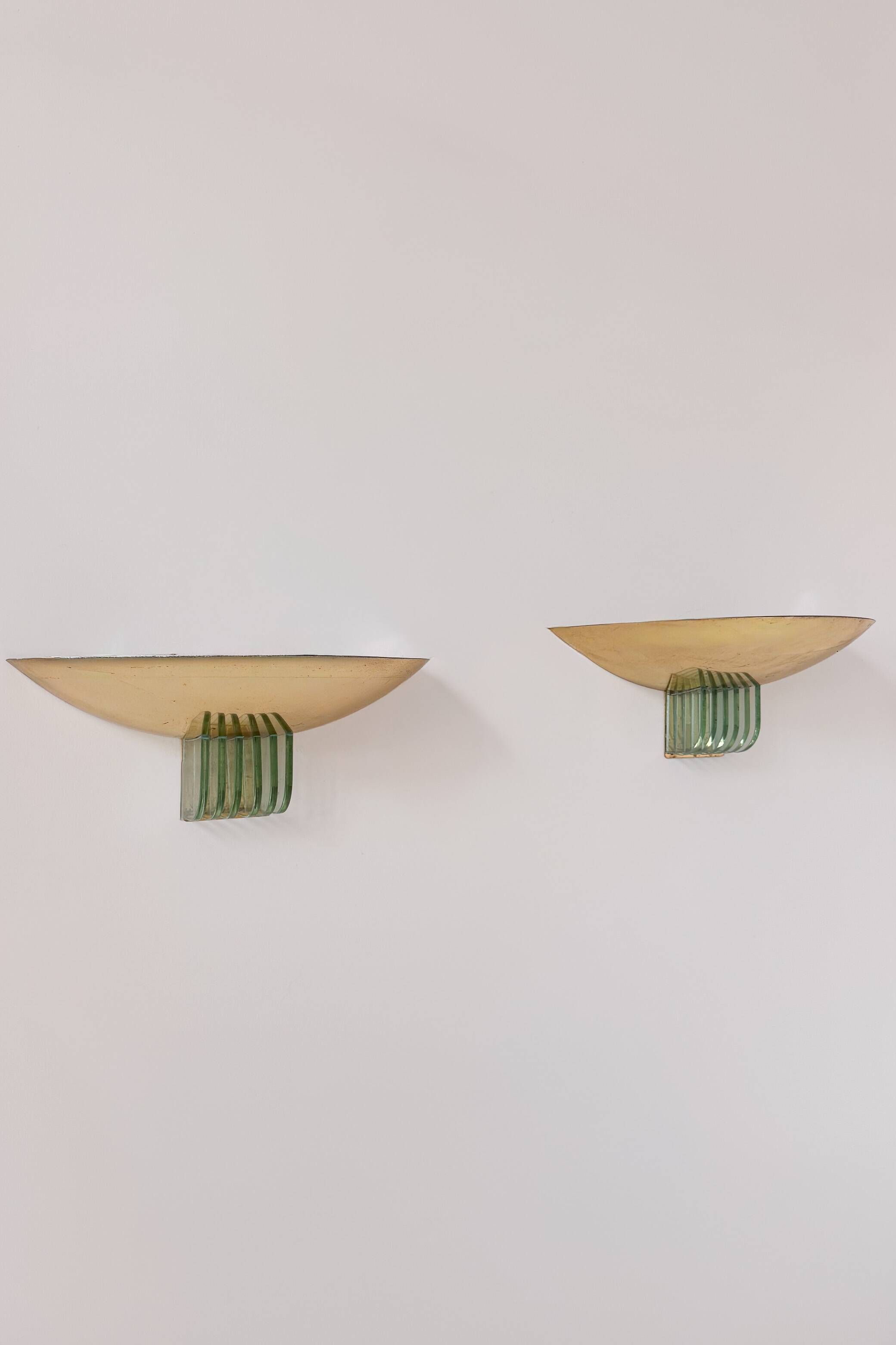 Pair of vintage brass and glass wall lights, France 1970.
