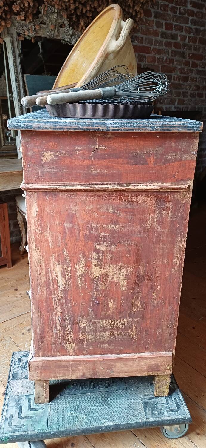 Antique piece of furniture with a grey patina.