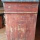 Antique piece of furniture with a grey patina.