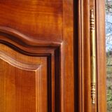 Louis XV style bonnetière in solid cherry wood