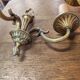 Two antique wall sconces in gilded bronze in the Louis XVI style.