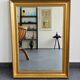 Golden mirror with bevelled glass – 70 × 52 cm