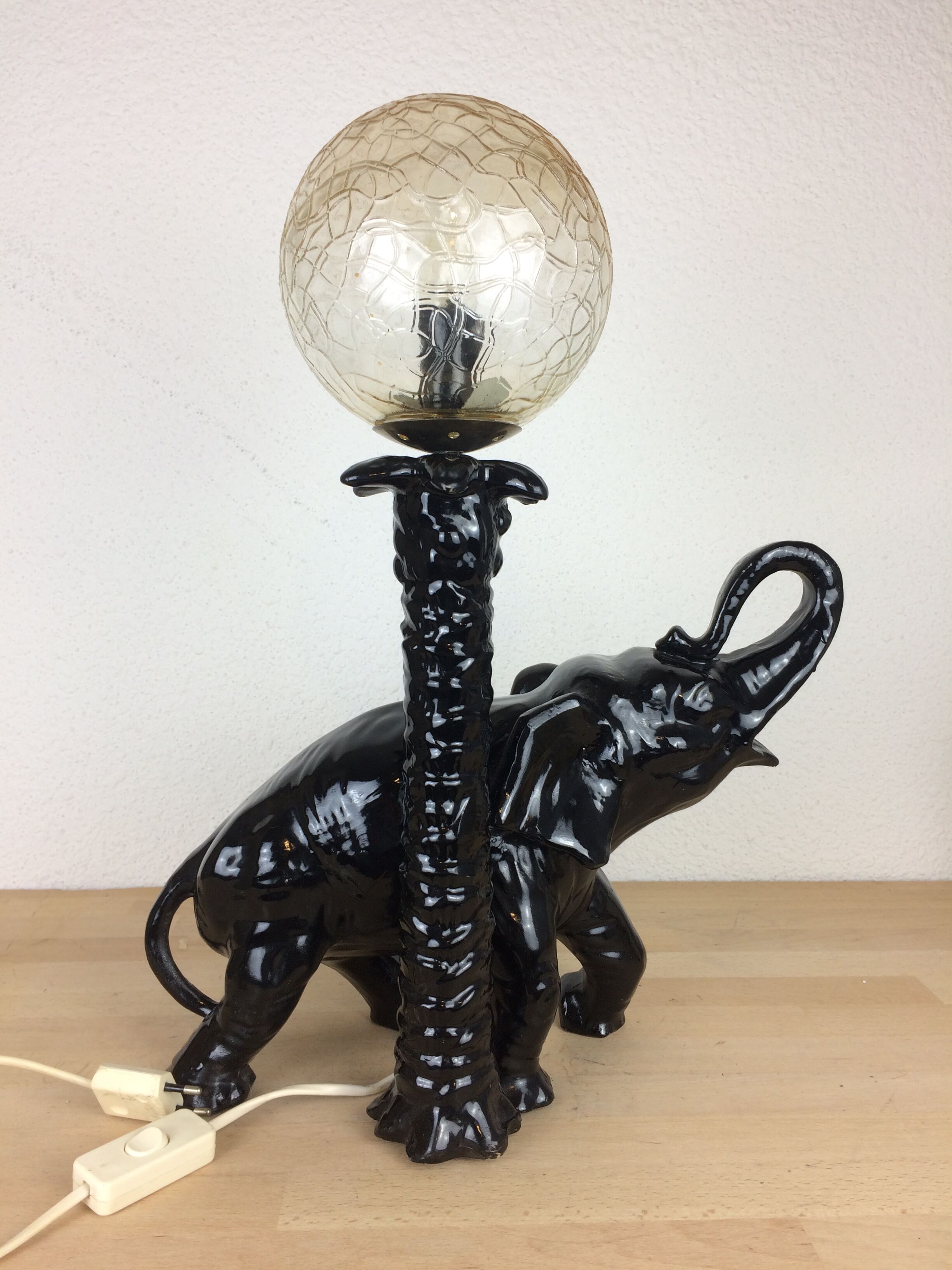 Elephant lamp and palm tree in black resin