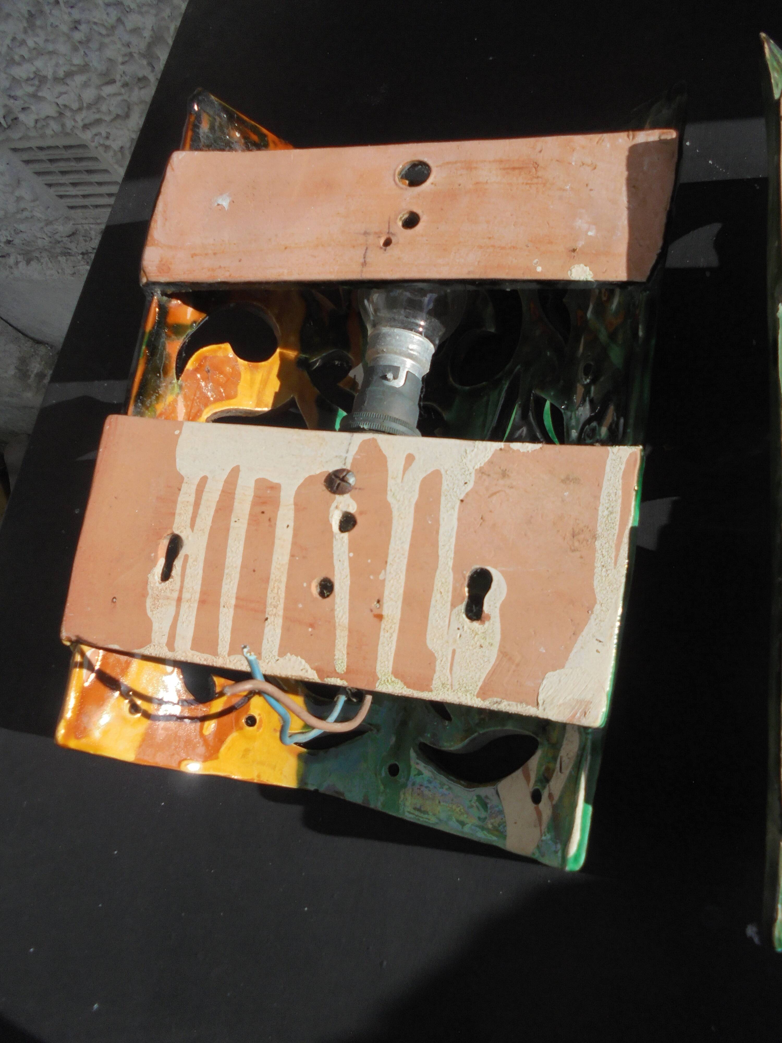 Pair of ceramic wall lights in Vallauris style, Brunin.