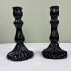 Pair of black opaline candlesticks