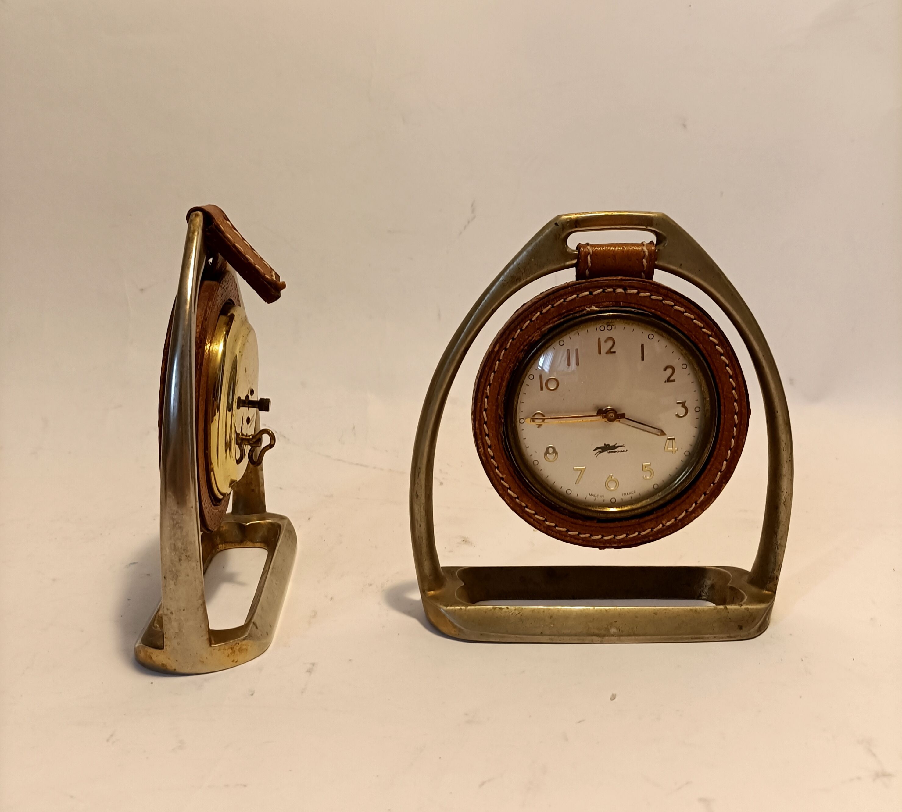 Pair of Longchamps 1960 leather stirrup pendulettes.