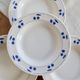 4 vintage deep plates in ivory earthenware with blue cherries