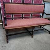 Ancienne banquette style Louis XVI en bois massif avec assise et dossier tissés