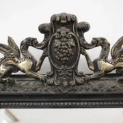 Antique 19th-century mirror with griffins and console table