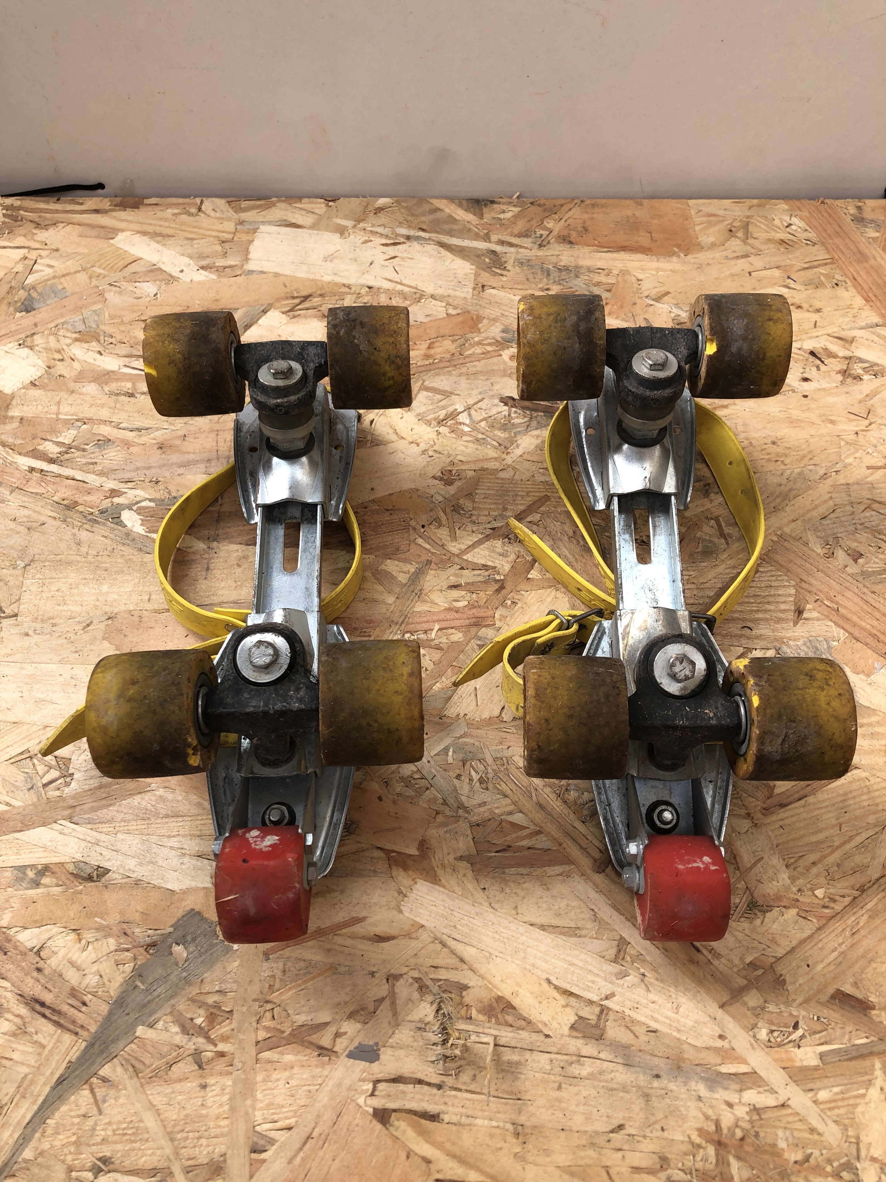 Old pair of speedy metal roller skates grey + straps & vintage brake