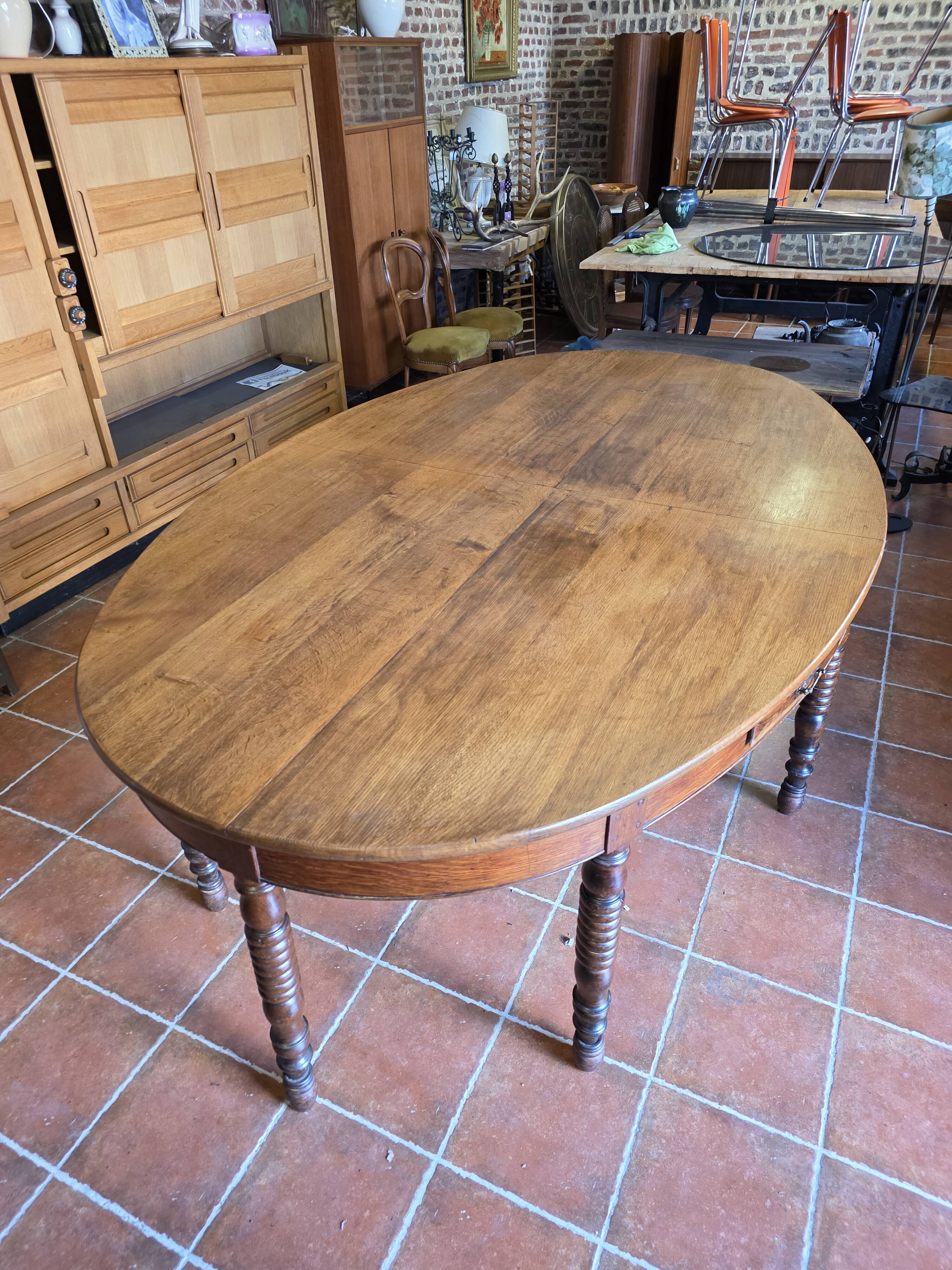 Large oval monastery table in solid oak, 19th century, 243×154cm
