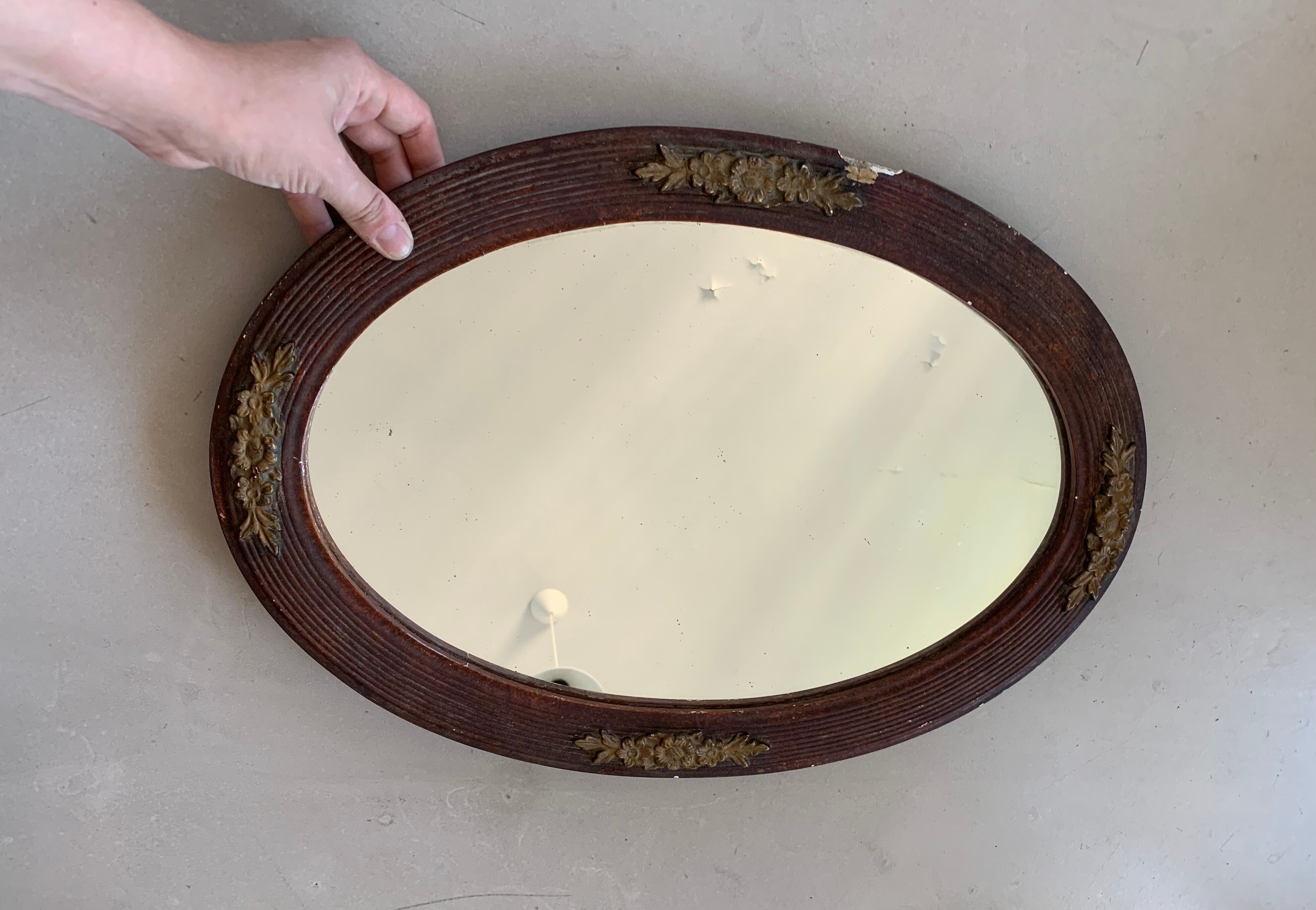 Old stitched oval mirror, 53x37 cm