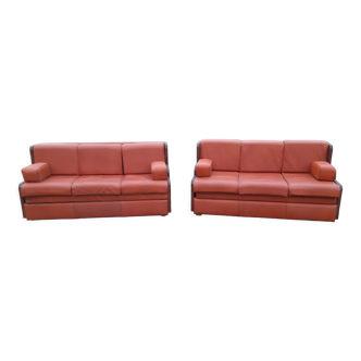 Pair of vintage exotic wood and brown imitation leather sofas
