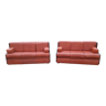 Pair of vintage exotic wood and brown imitation leather sofas