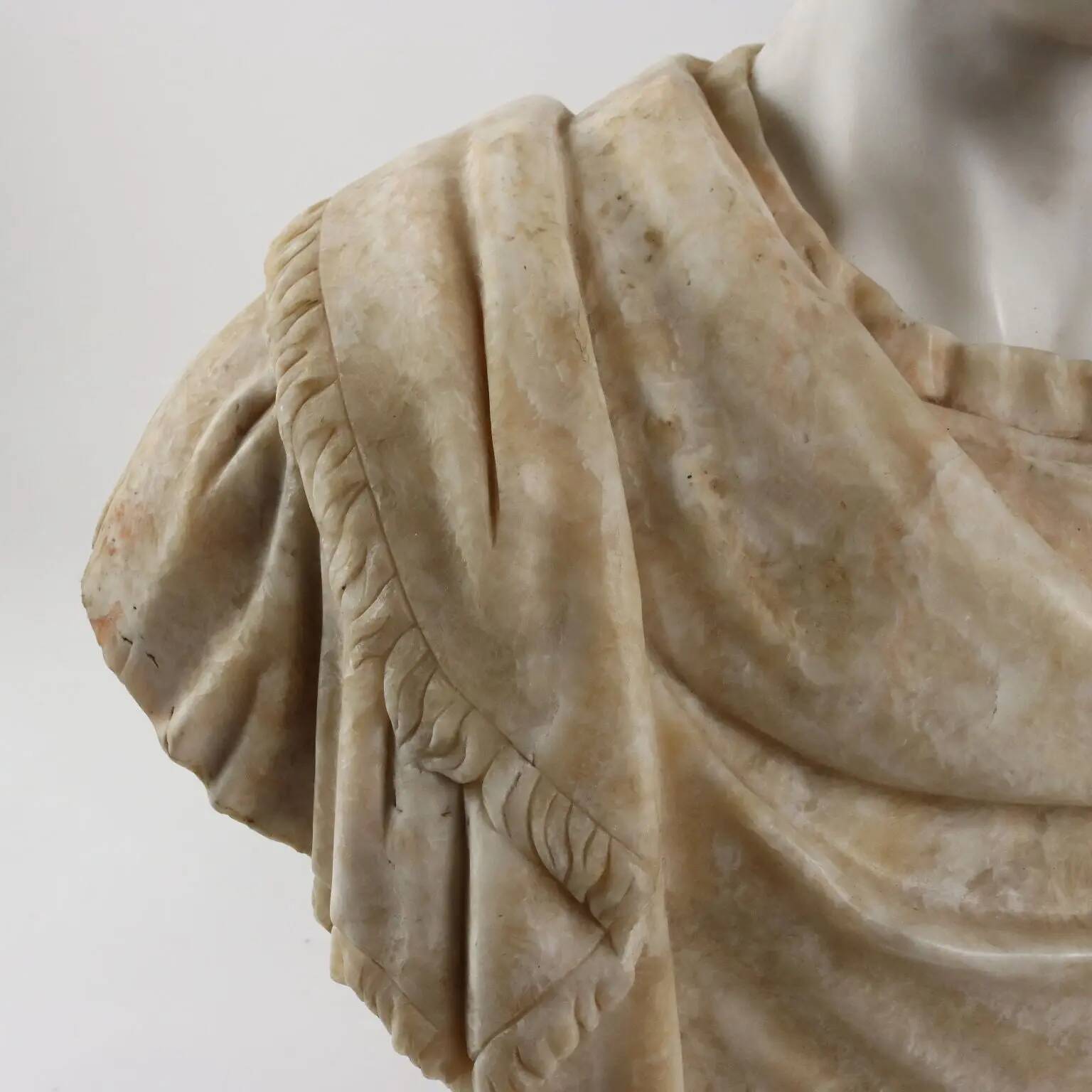 Bust of a Roman emperor in white marble, Italy, 20th century.
