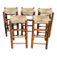 5 tabourets de bar en bois et paille style Charlotte Perriand