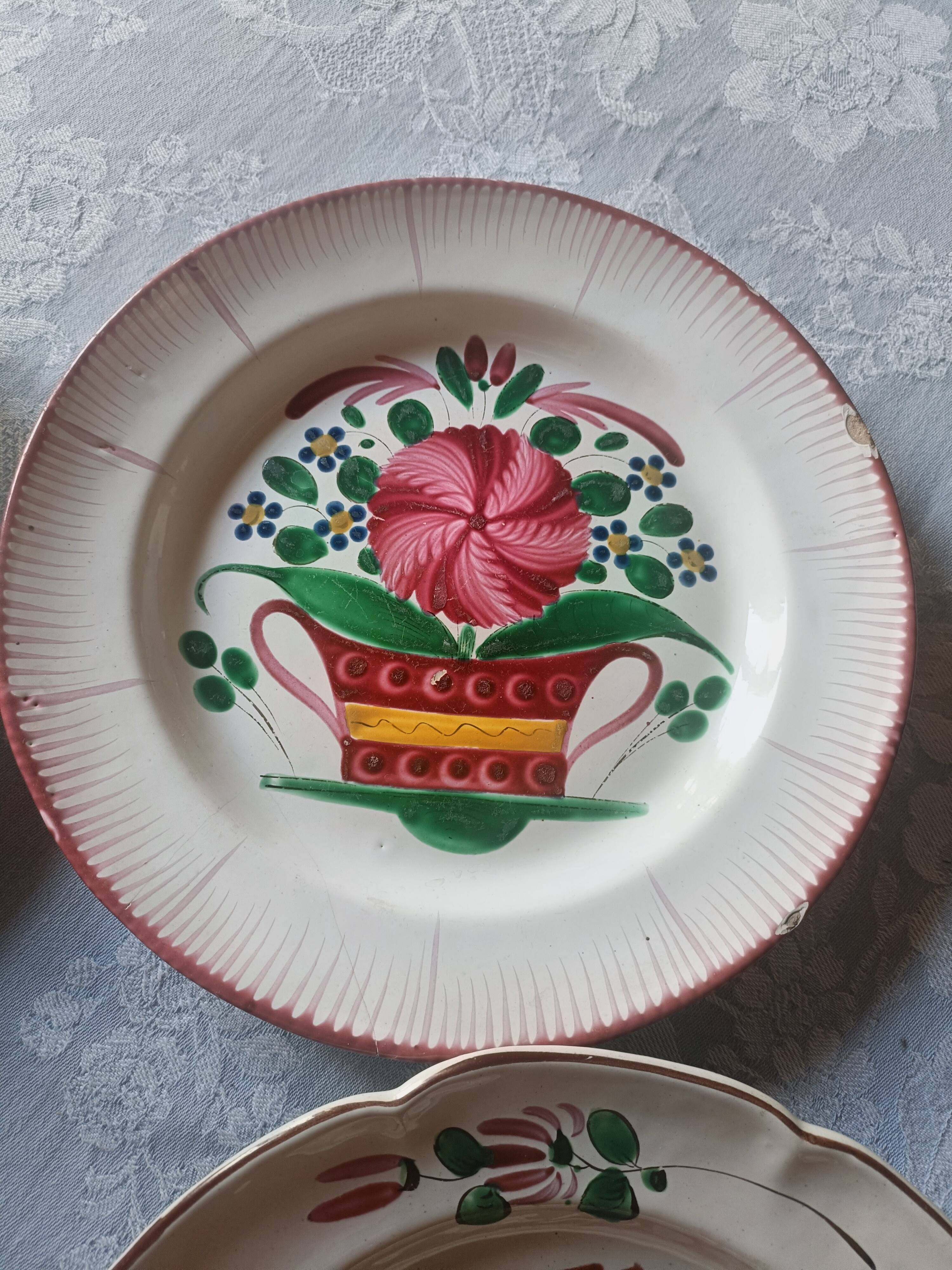 Set of 4 19th-century earthenware plates.