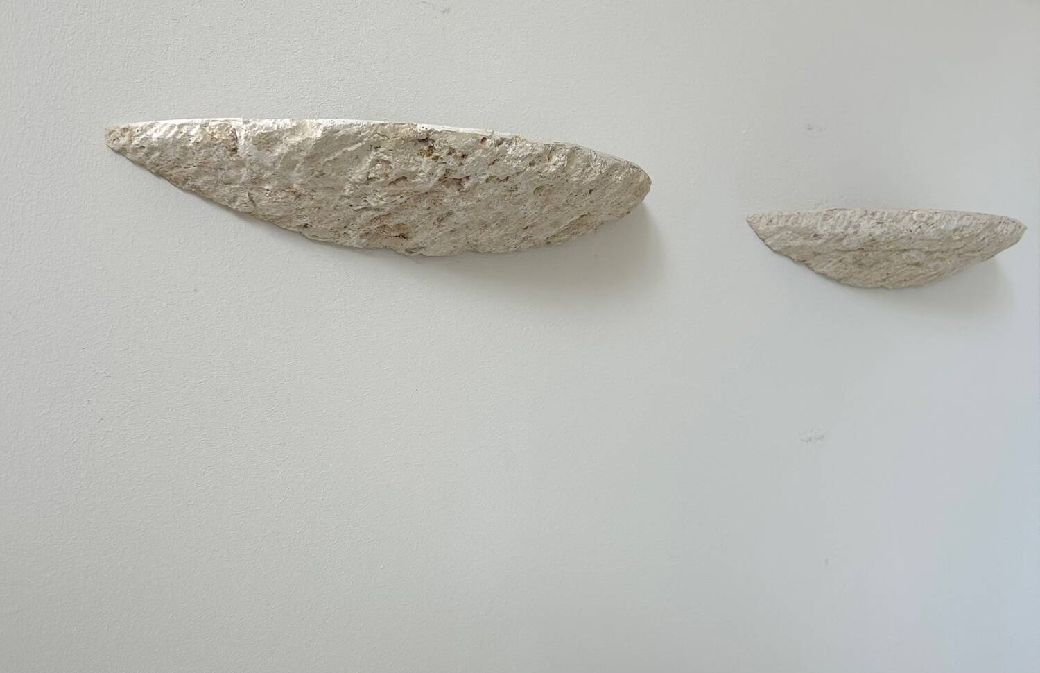 Pair of vintage stone sconces, natural beige, Italy 1979