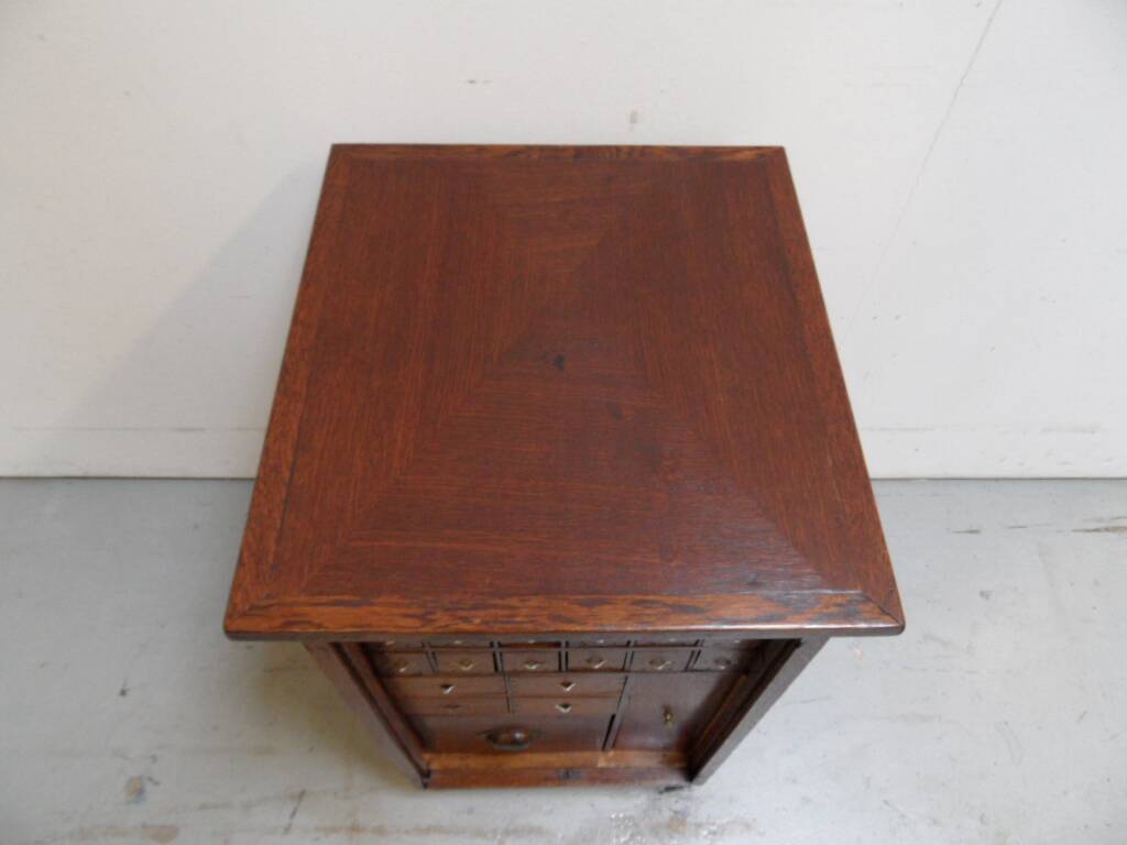 Antique watchmakers cabinet with drawers