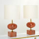 Pair of lamps in red travertine and brass 1970