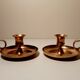 Pair of brass hand candlesticks