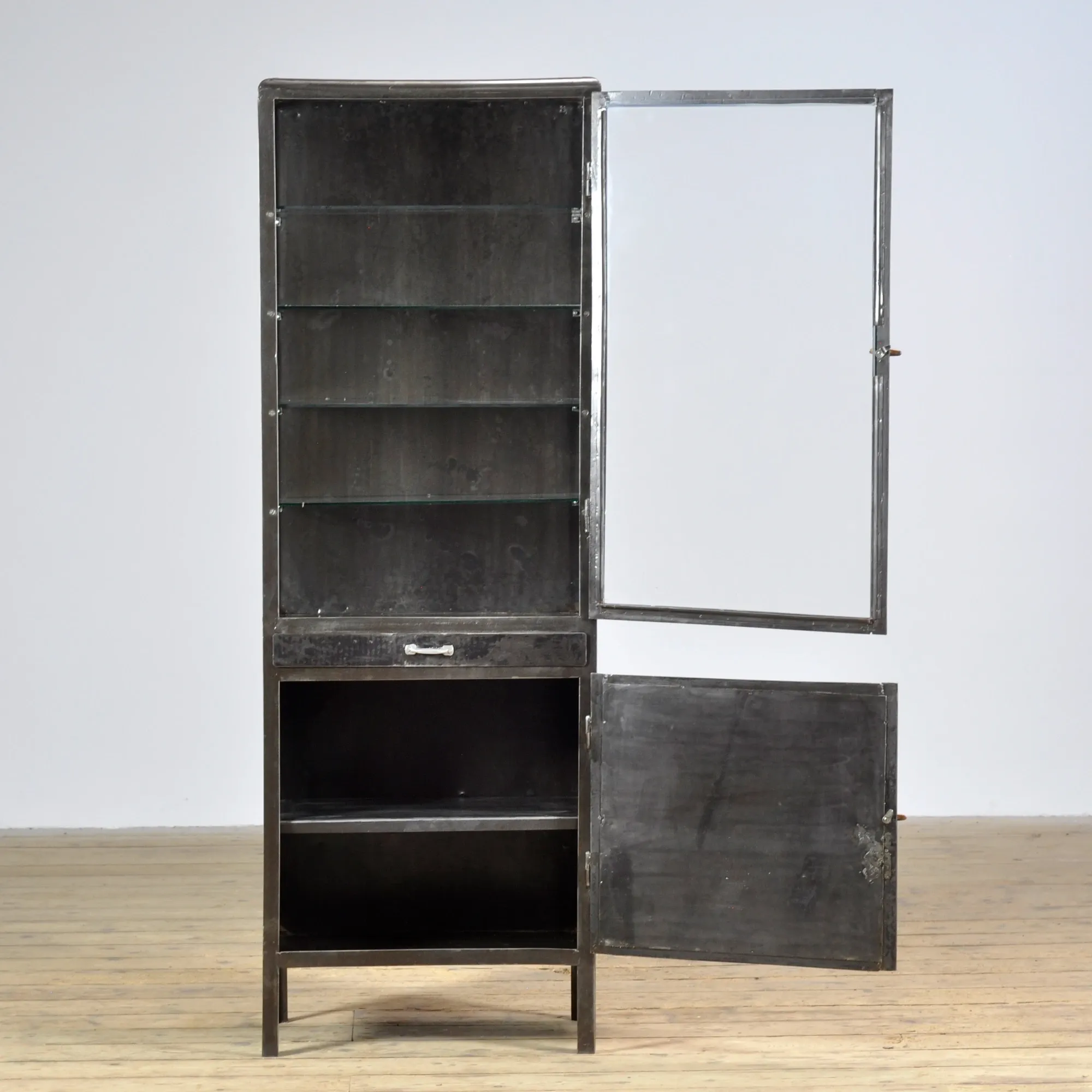 Polished iron medicine cabinet, 1950s