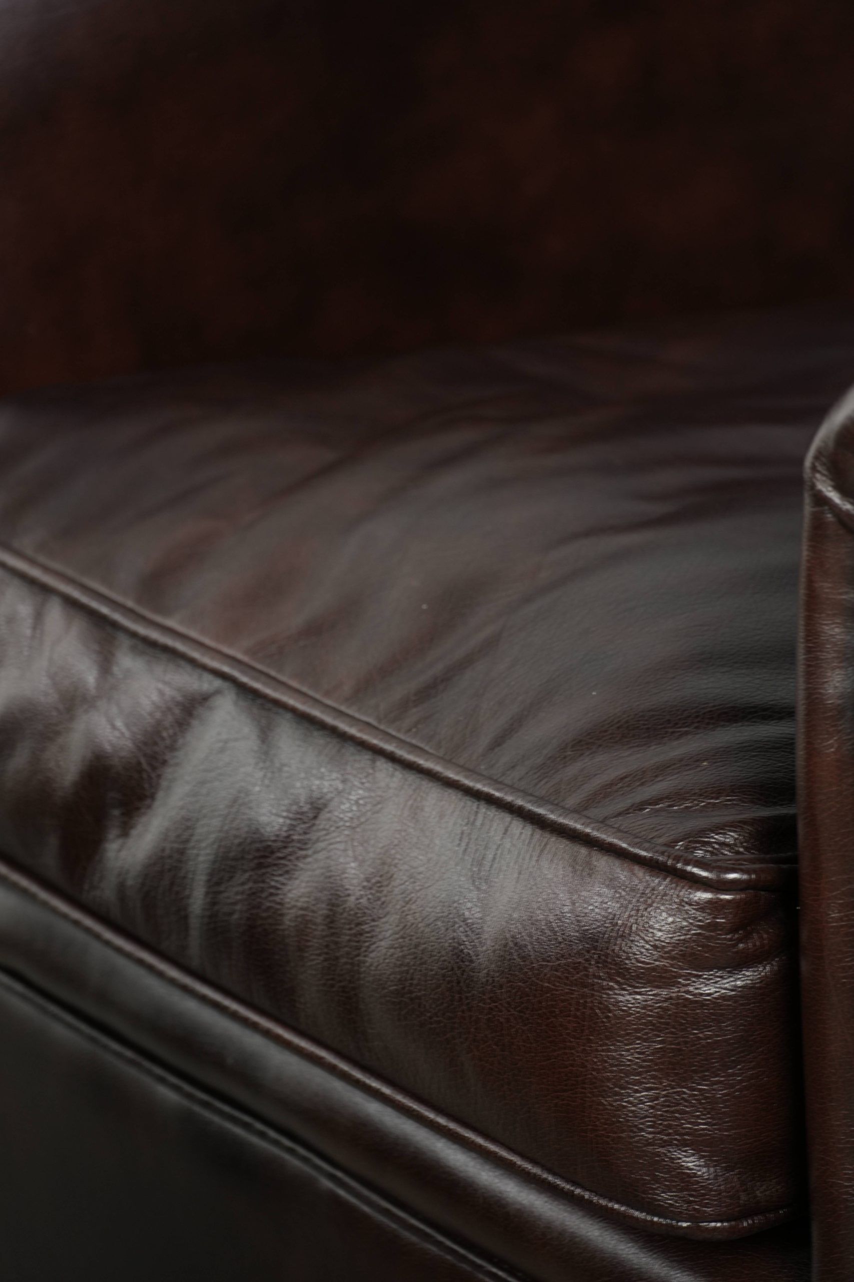 Set of two cowhide club armchairs in good condition with a English design