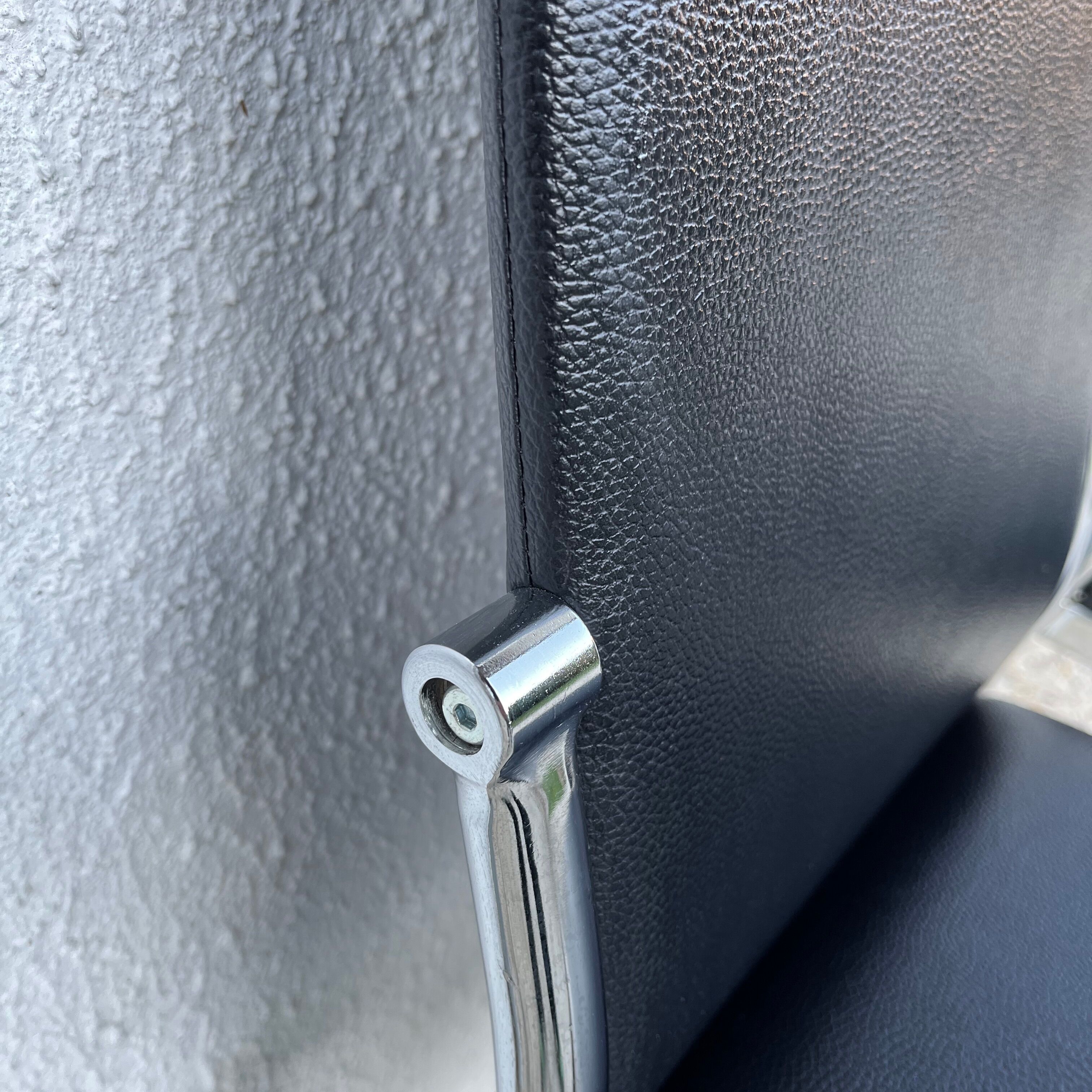 Design chair in black skaï