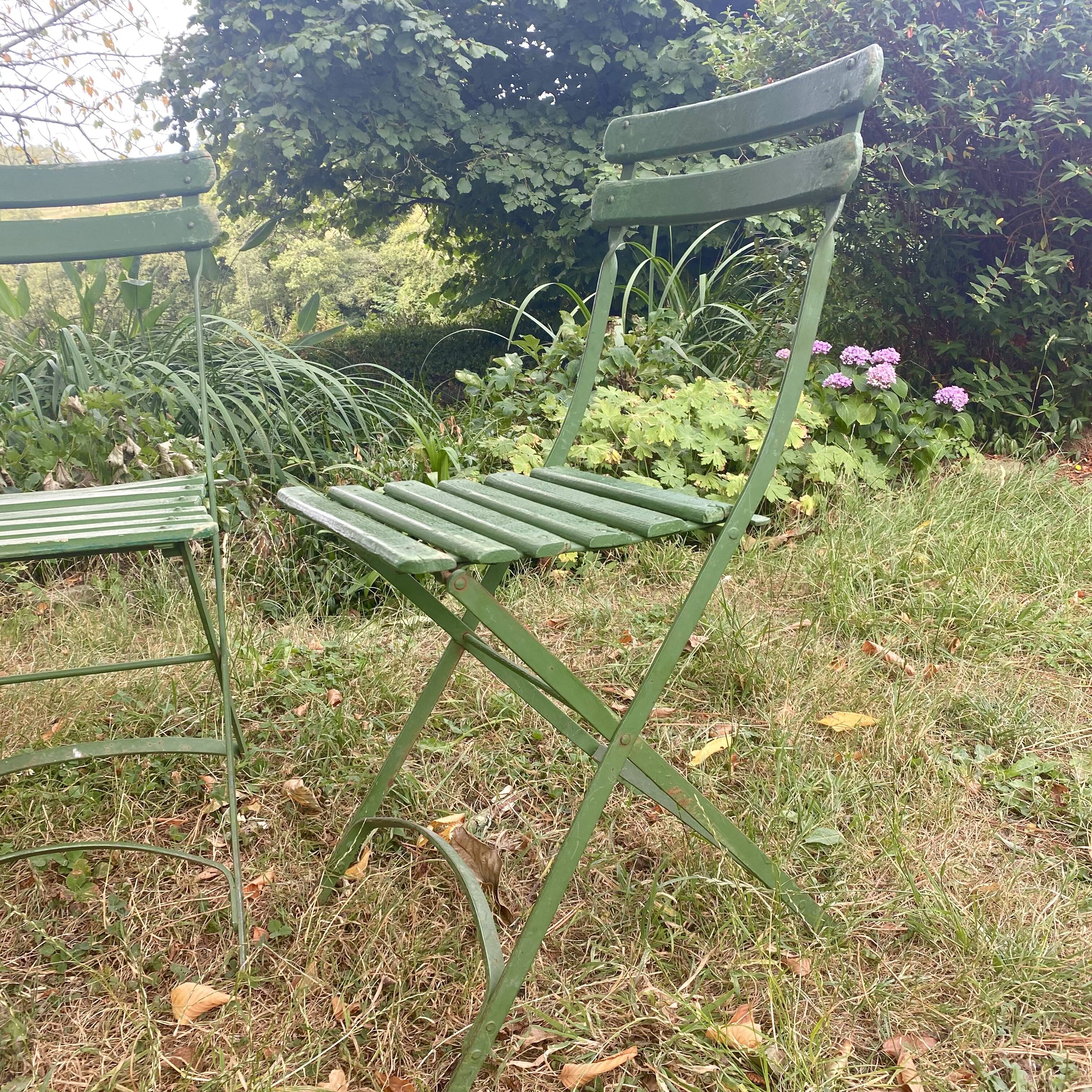Antique folding garden chairs with wooden slats