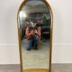 Miroir à tablette cerclage bois, forme ogive, années 60