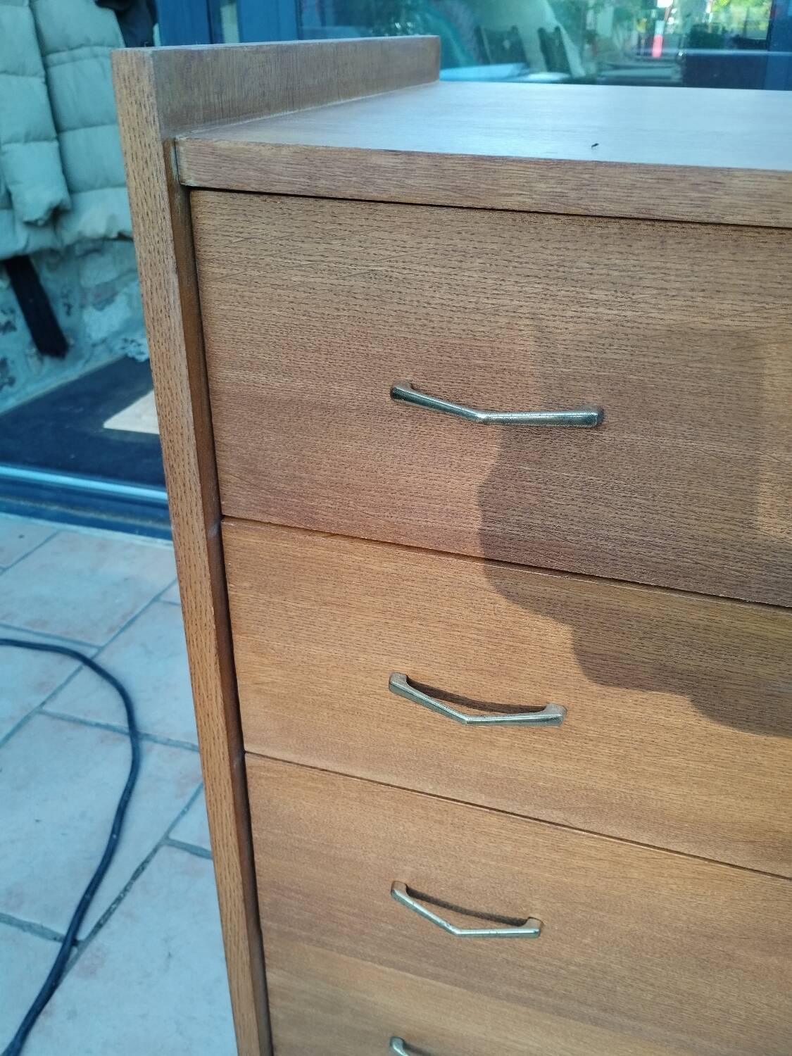 Old vintage chest of drawers with compass feet