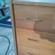 Old vintage chest of drawers with compass feet