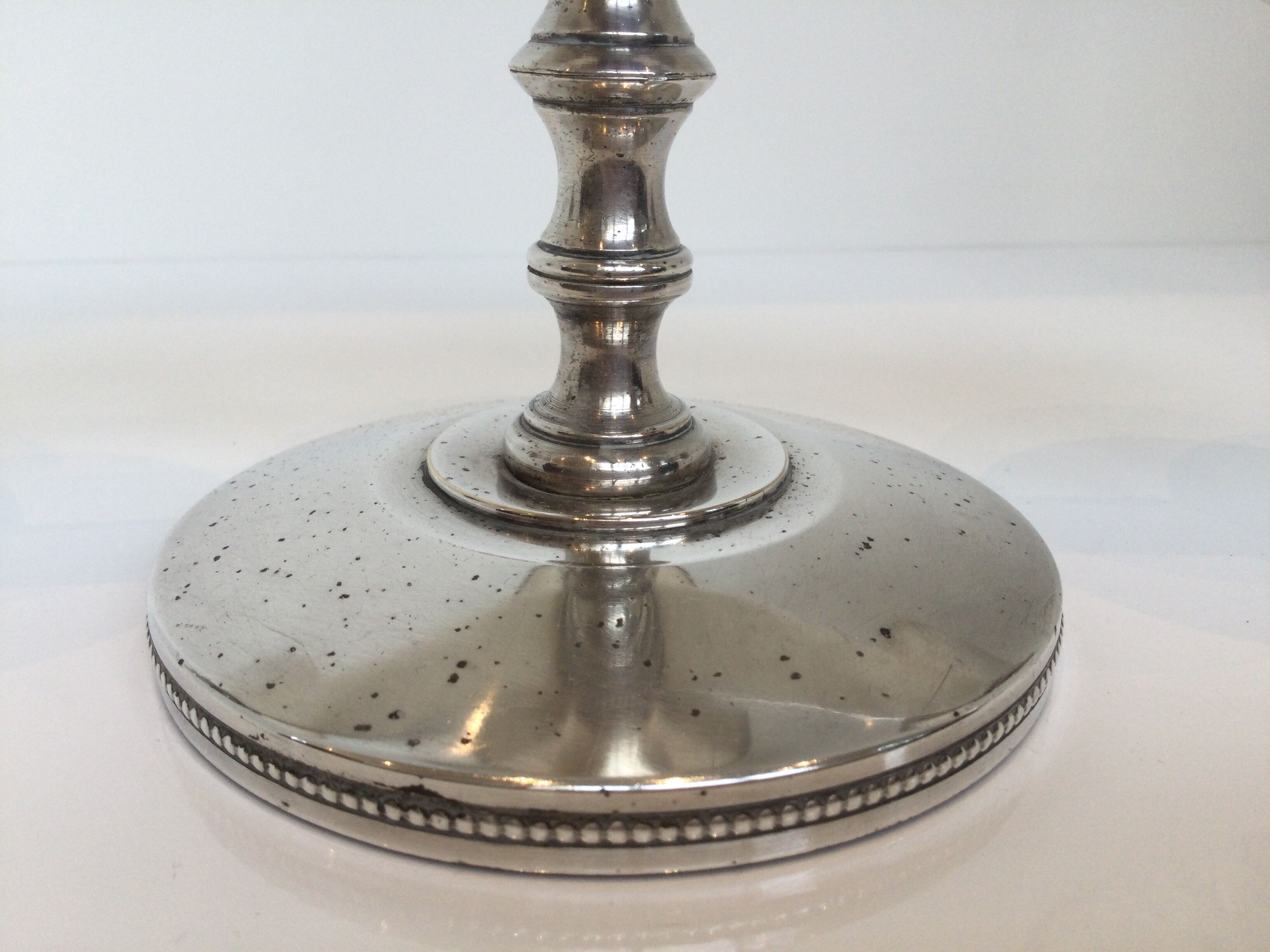 Candle holders or candlesticks made of silver metal