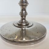 Candle holders or candlesticks made of silver metal