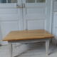 Vintage coffee table patinated pearl gray waxed finish, top against glued varnished oak